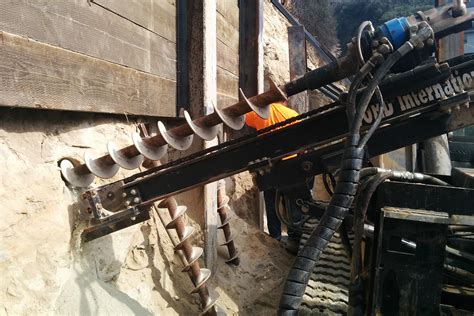 skid steer attachment vertical post word|rock skid steer attachment.